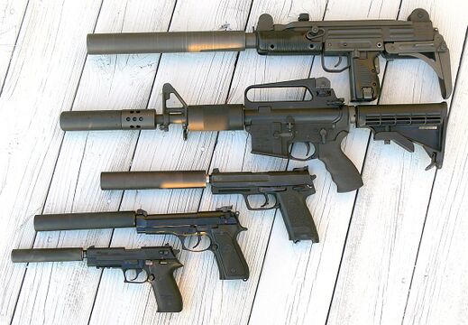 Sound suppressors, the cylindrical tubes at left, mounted on several firearms. The outer body of a suppressor is a hollow threaded cylinder. Source Wikimedia Commons (Cortland, public domain).