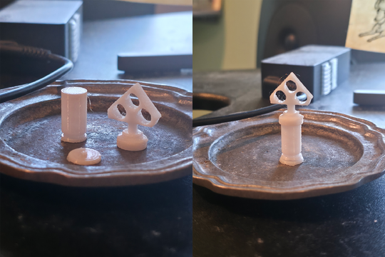 A side by side picture of 3D printed parts of a chess piece. The left hand side shows the three pieces of the part, a base, mid section (closely matching the diamter of a 9mm casing), and a top ornamental section. The right hand side shows the assembled chess piece. Source (user Monke OS)