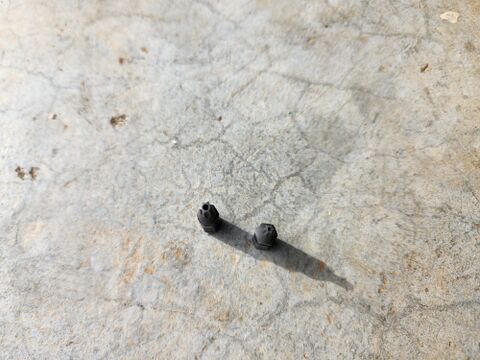 The two security Torx bits in different sizes required to get the screws out of the scooter for repair. The owner did not own these before starting the repair. For anyone unwilling to buy a specialty bit set for one tire change on a roughly $200 scooter, the simpler path is to throw the scooter away.